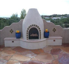 Exterior Flagstone surrounding a Kiva-style fireplace